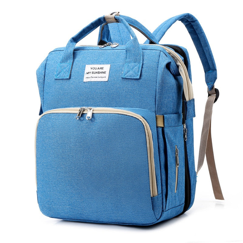 All-in-One Baby Travel Solution - Changing Bag with Crib & Waterproof Pad